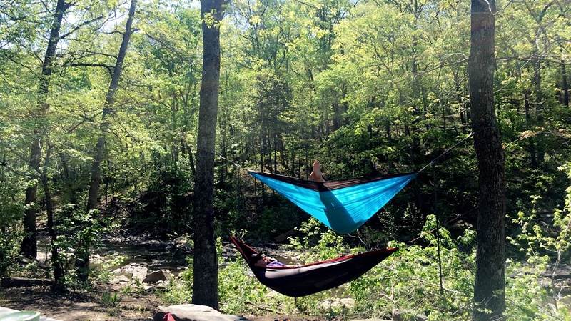 Two students in hammocks at Devil's Den State Park